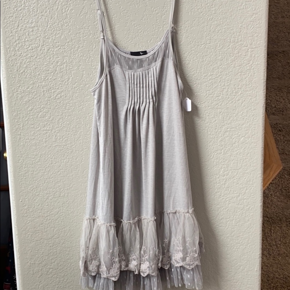 Lace trimmed tunic tank. Size Large.